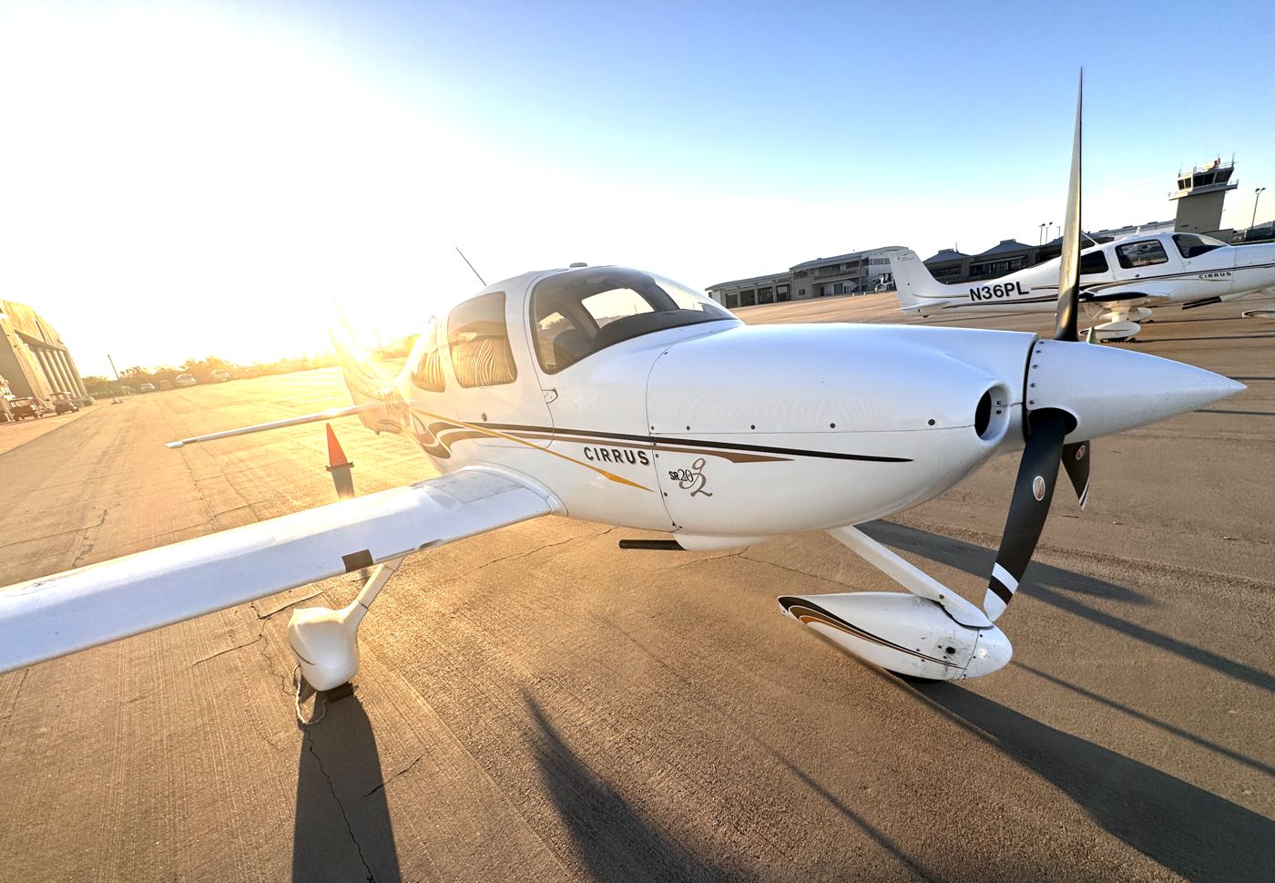 Cirrus SR20 on the ramp at sunset